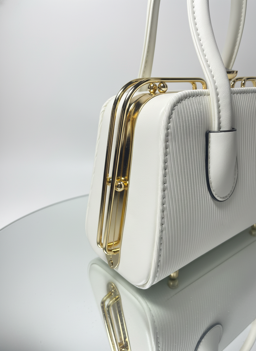 Elegant White Textured Handbag with Gold Hardware