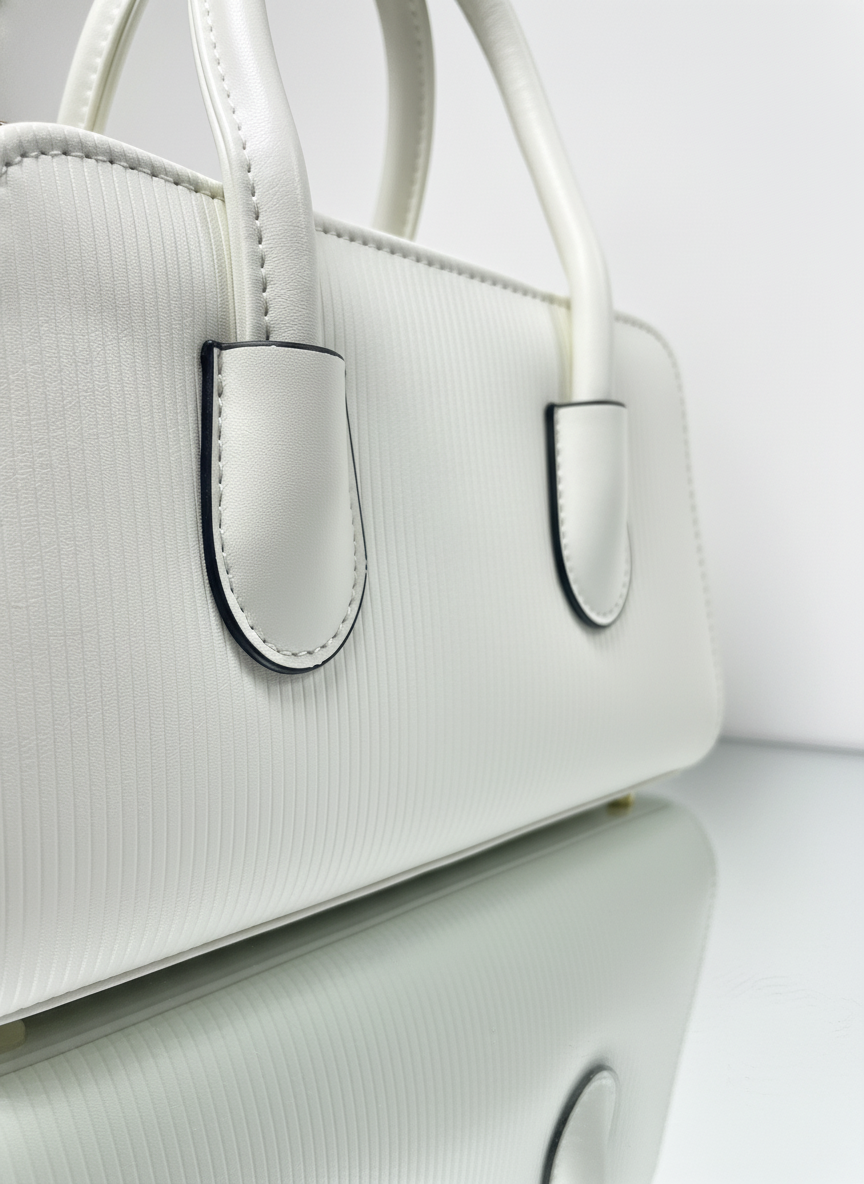 Elegant White Textured Handbag with Gold Hardware