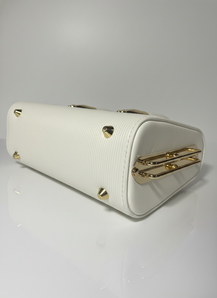 Elegant White Textured Handbag with Gold Hardware