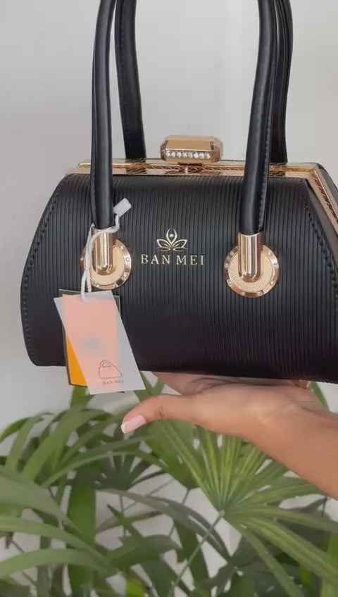 Elegant Black Textured Handbag – Premium Gold Hardware