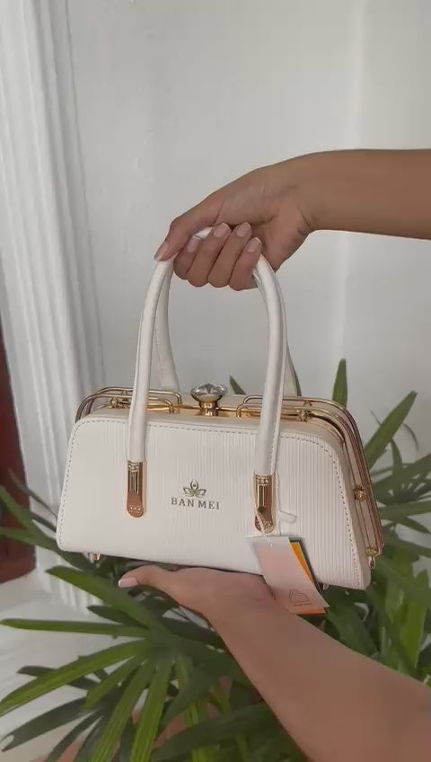 Elegant White Textured Handbag with Gold Hardware